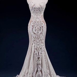 Beautiful sequined sweetheart wedding dress